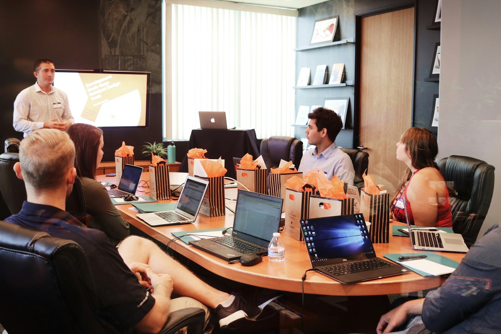 Marketing team collaborating around a desk